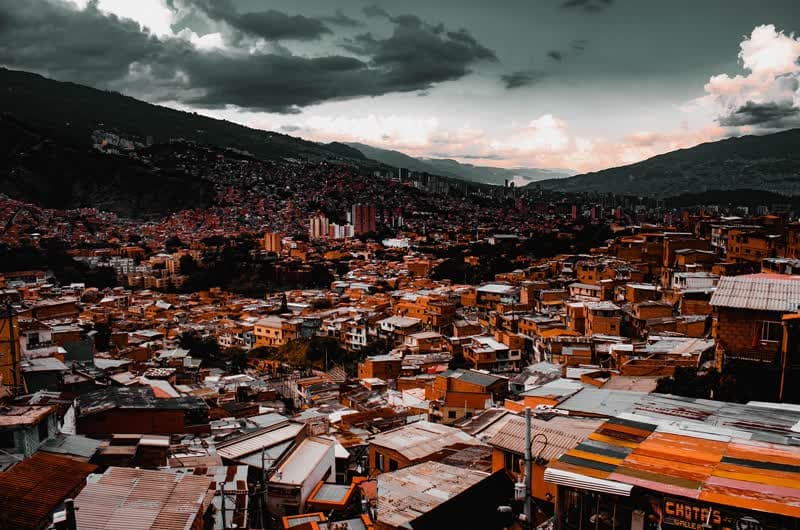 Rooftops across a Medellín hillside barrio
