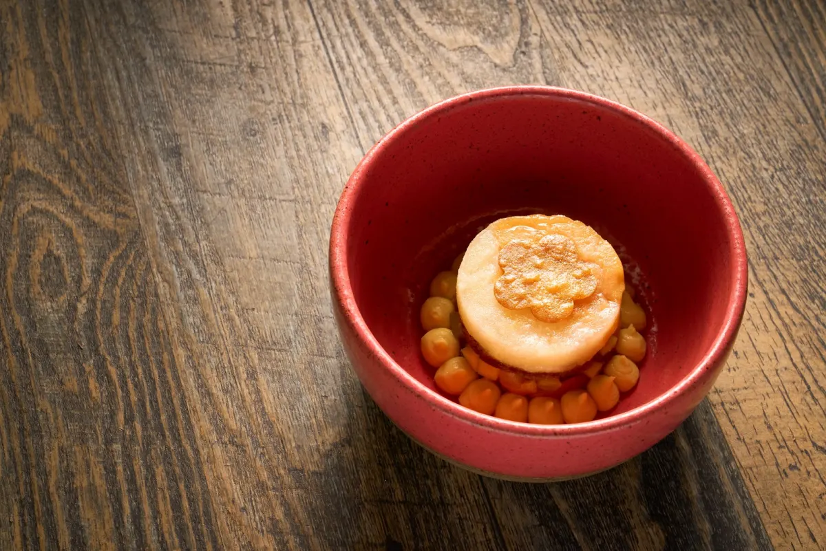 A dessert served in a red bowl at Carmen